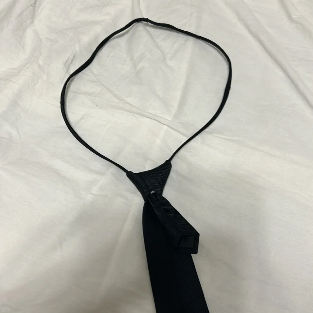 Neck Tie in black, zipper adjustable. Formal wear Preowned great condition.